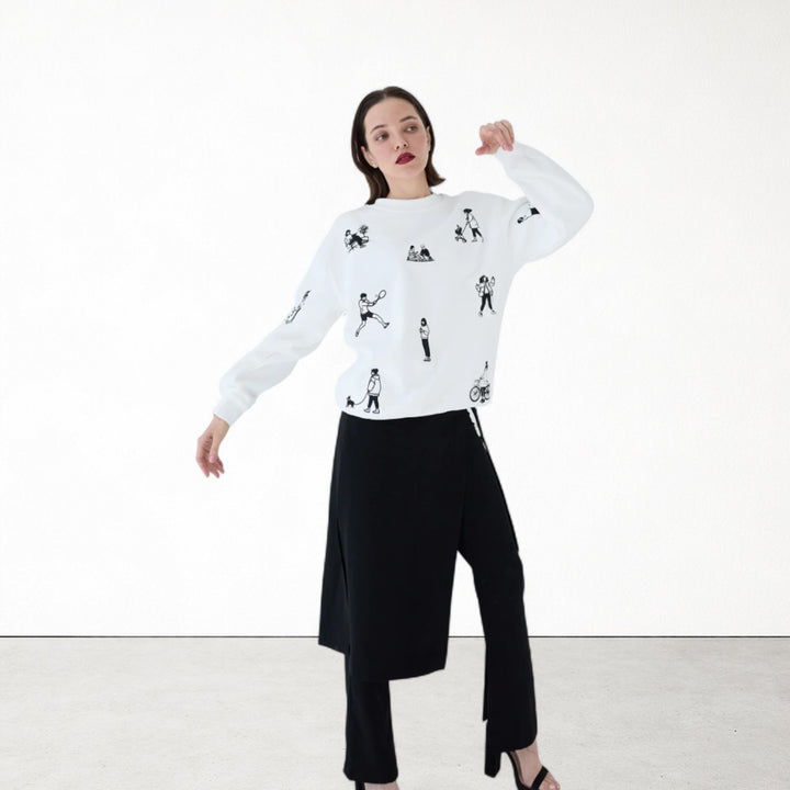 White heavyweight jumper with people embroidery
