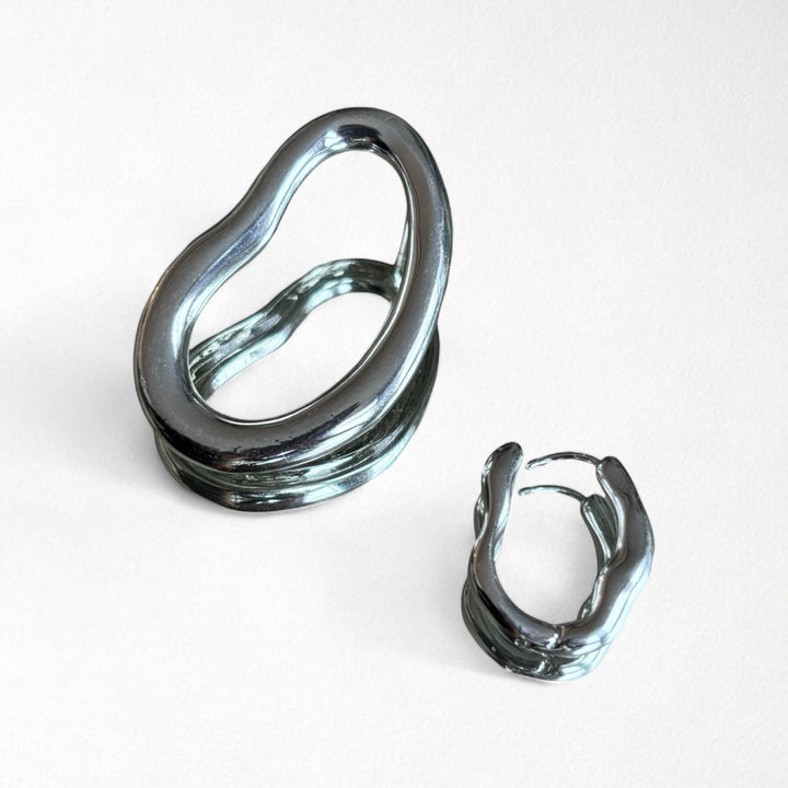 Minimalist asymmetric silver hoop earrings