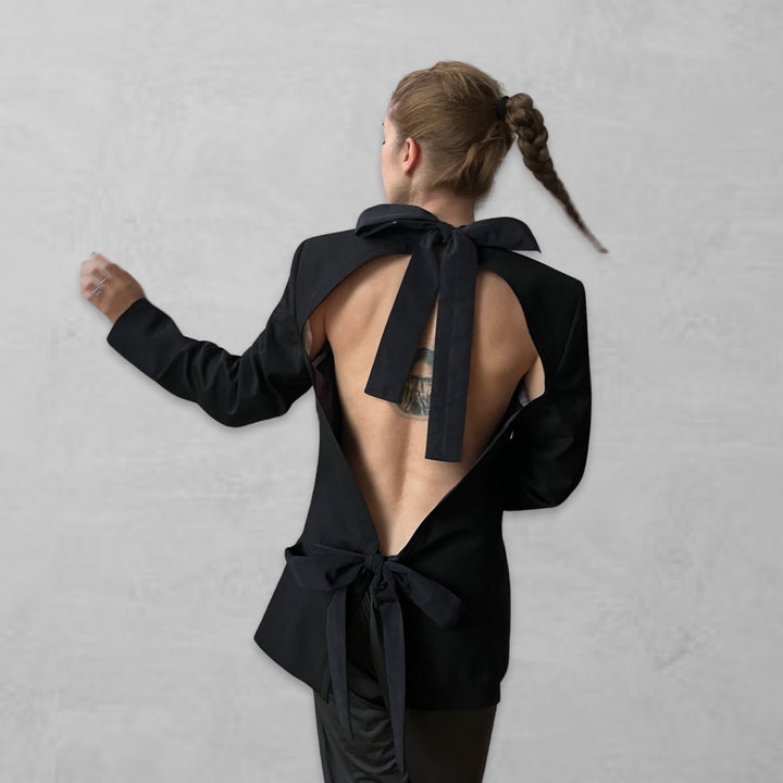 Reworked black blazer with open back and black bows