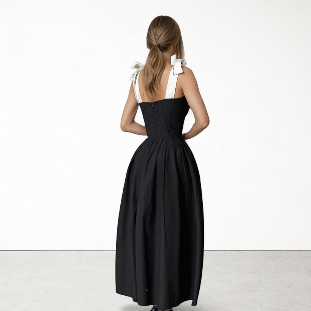 Black corset dress with contrasting trap ties