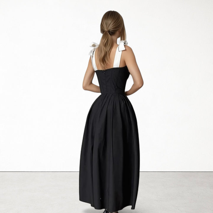 Black corset dress with contrasting trap ties