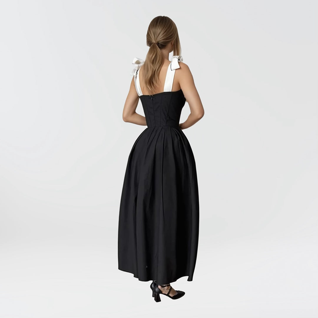 Black corset dress with contrasting trap ties