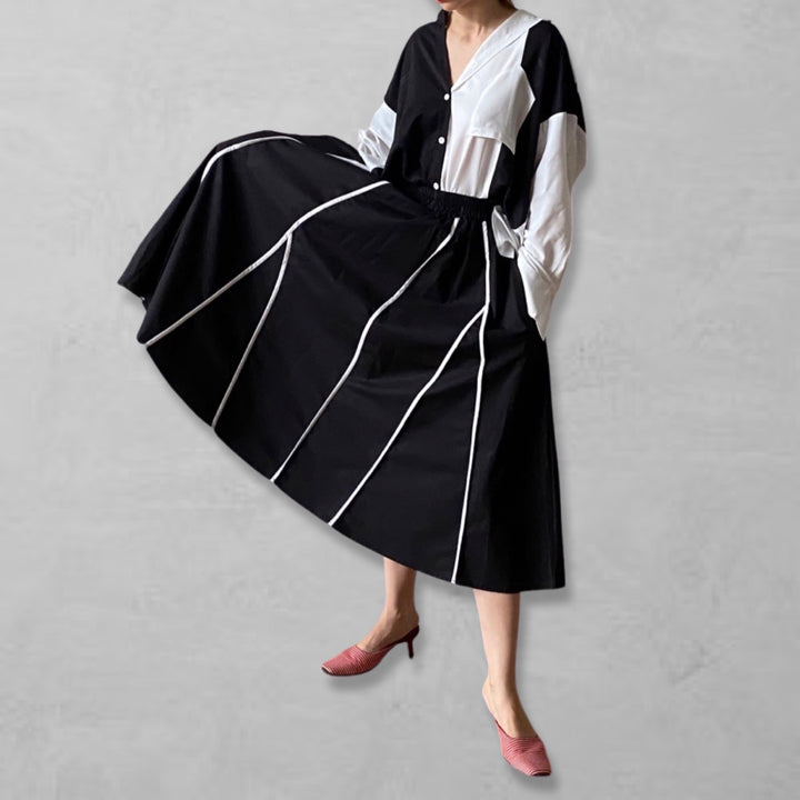 Black full skirt with panels and white contrast tape