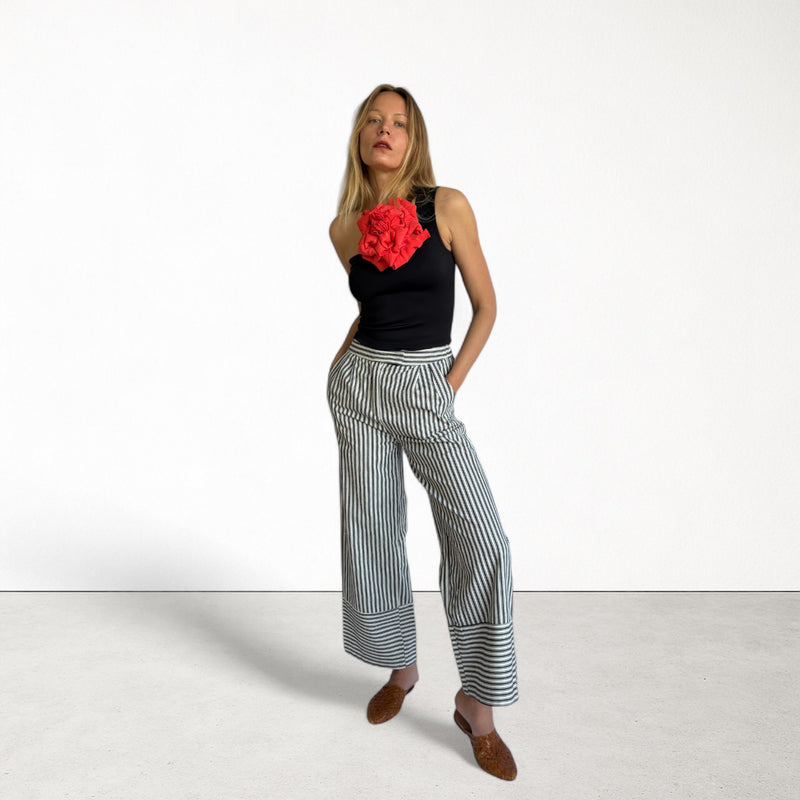 Black One Shoulder Top With Red Flower Pin