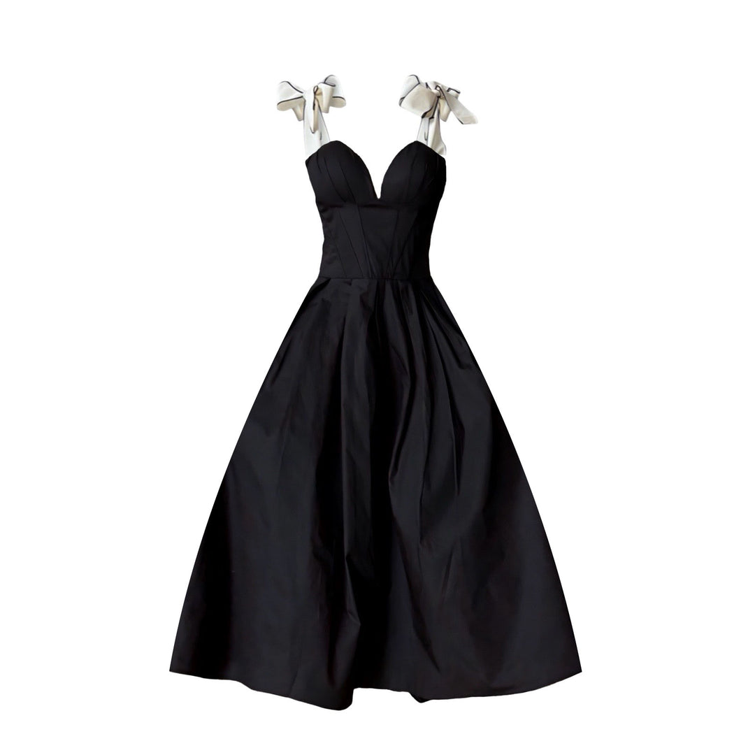 Black corset dress with contrasting trap ties