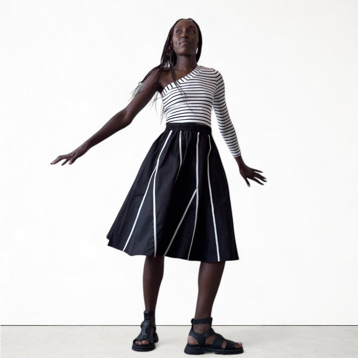 Black skirt with panels and white contrast tape