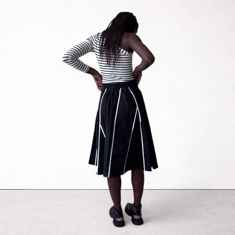 Black Skirt With Panels And White Contrast Tape