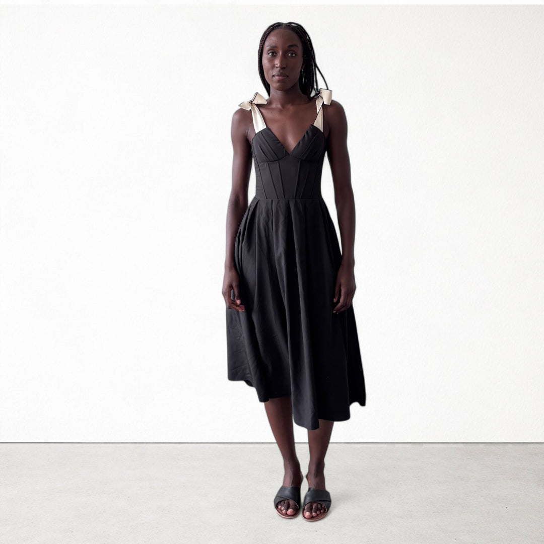 Black corset dress with contrasting trap ties