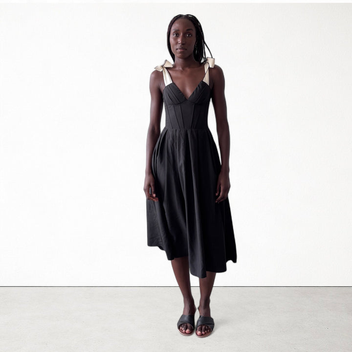 Black corset dress with contrasting trap ties