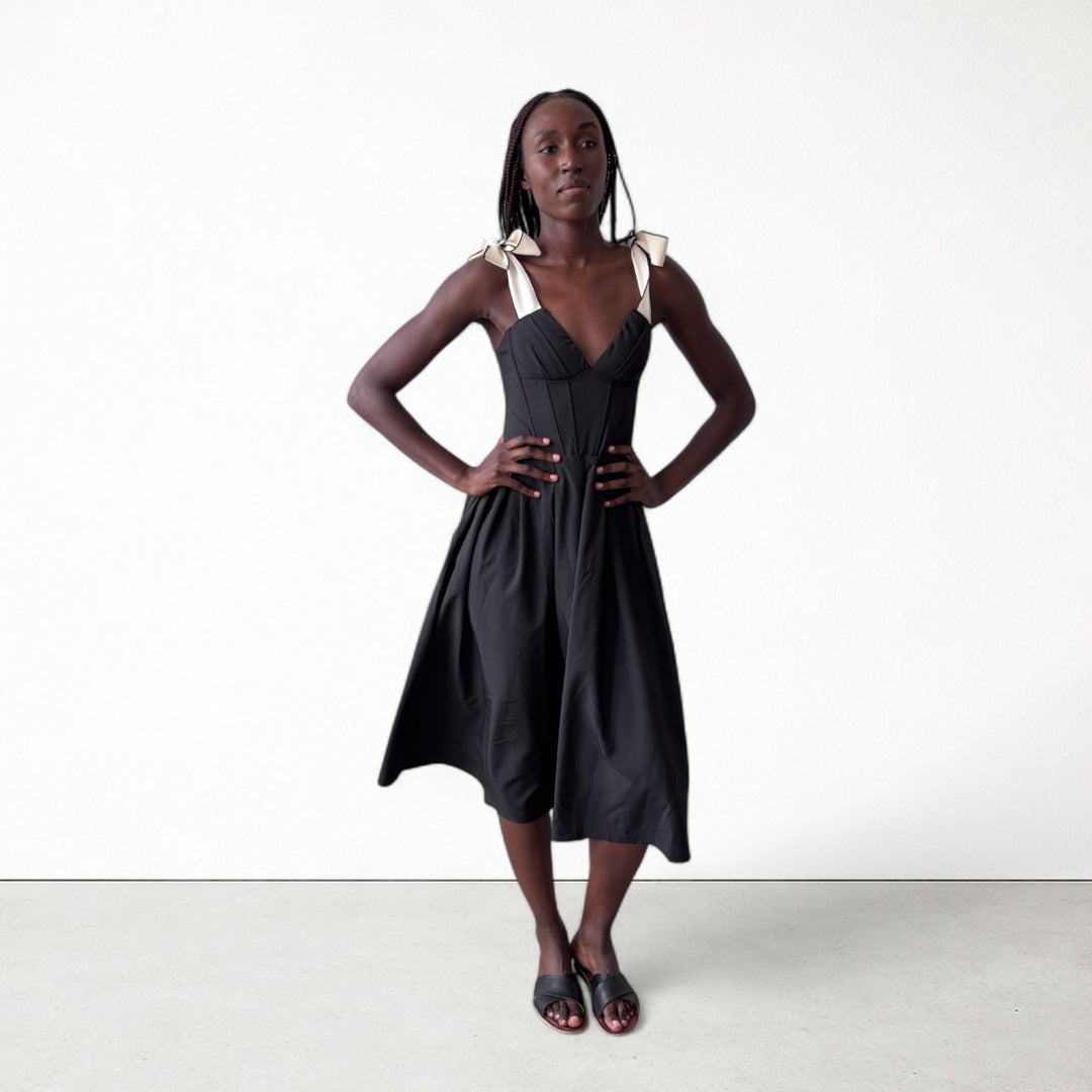 Black corset dress with contrasting trap ties