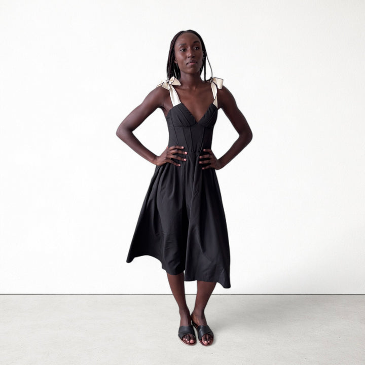 Black corset dress with contrasting trap ties