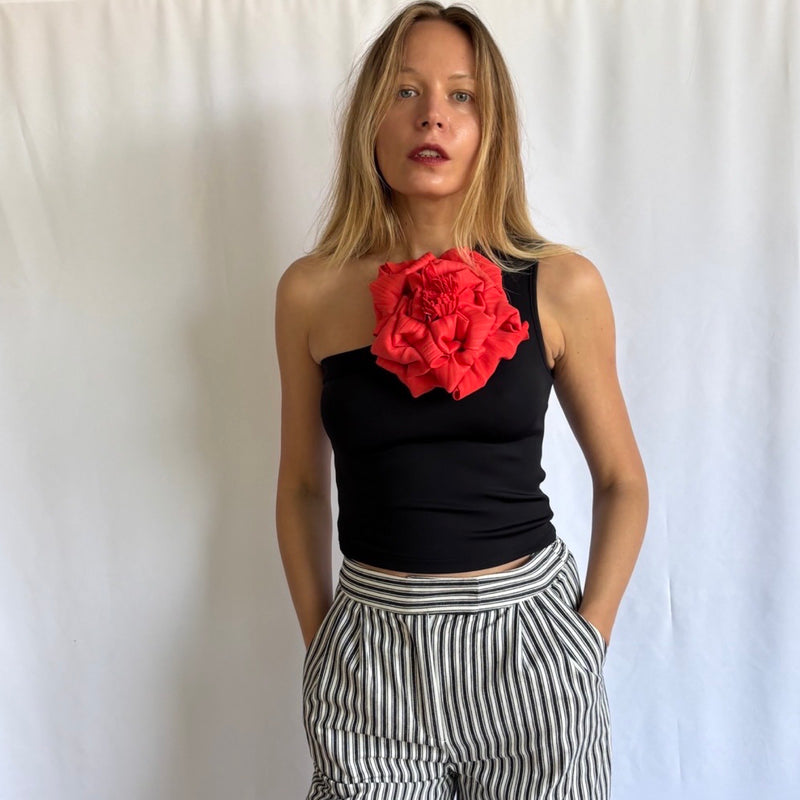 Black One Shoulder Top With Red Flower Pin