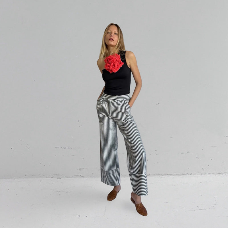 Black One Shoulder Top With Red Flower Pin
