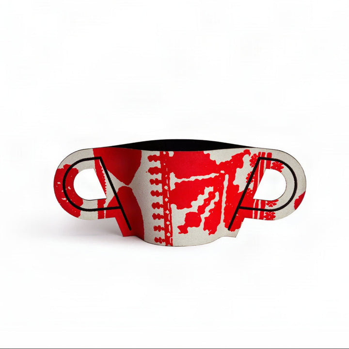 A ceramic coffee mug with integrated loop handles, featuring a bold red abstract brushstroke pattern on a white background with black outlines.