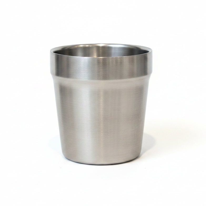 Metallic cup on a white background