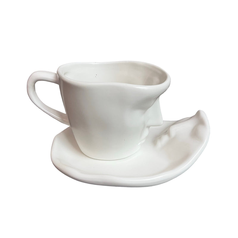White Face Sculptural cup and saucer 