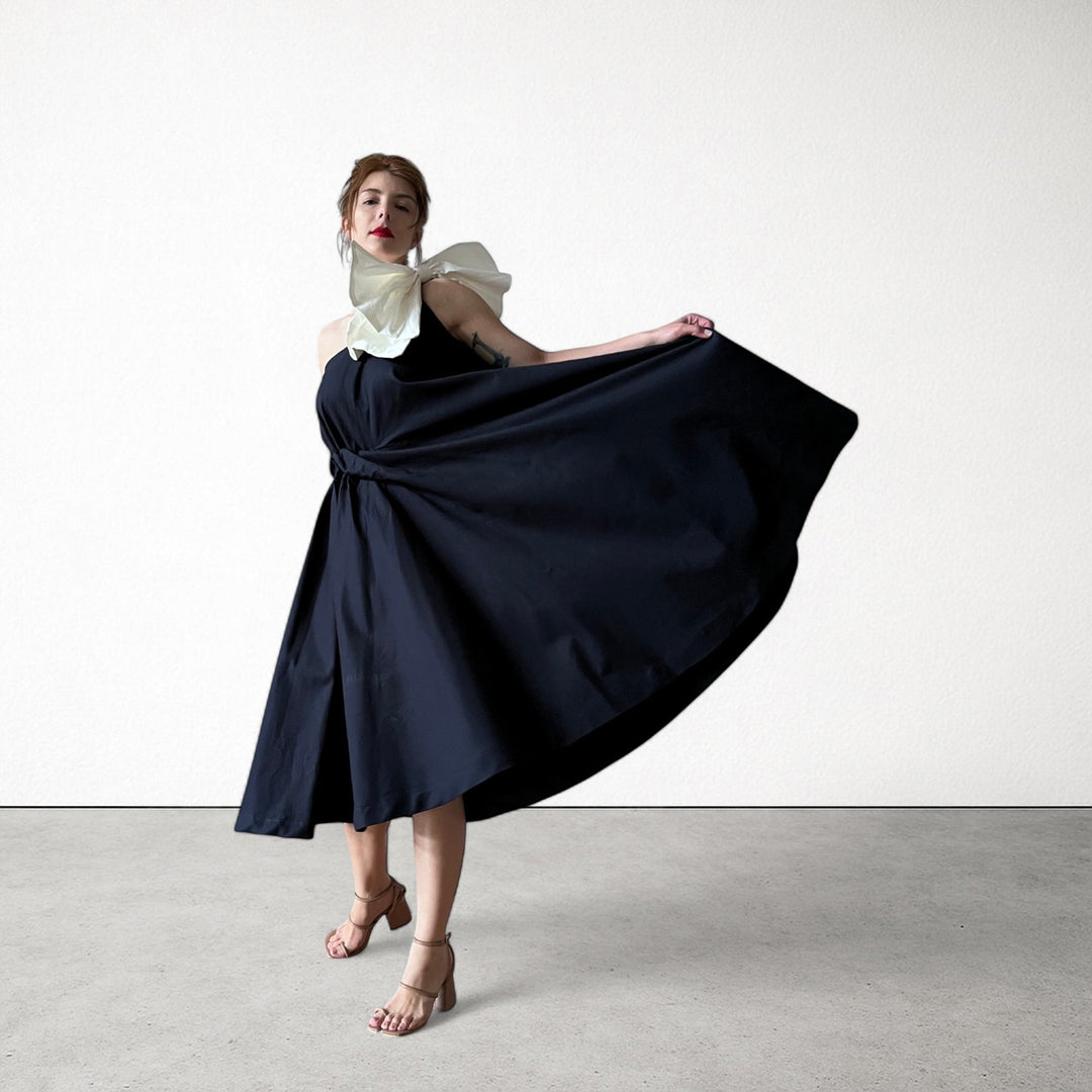 Navy cloche dress with one shoulder white bow