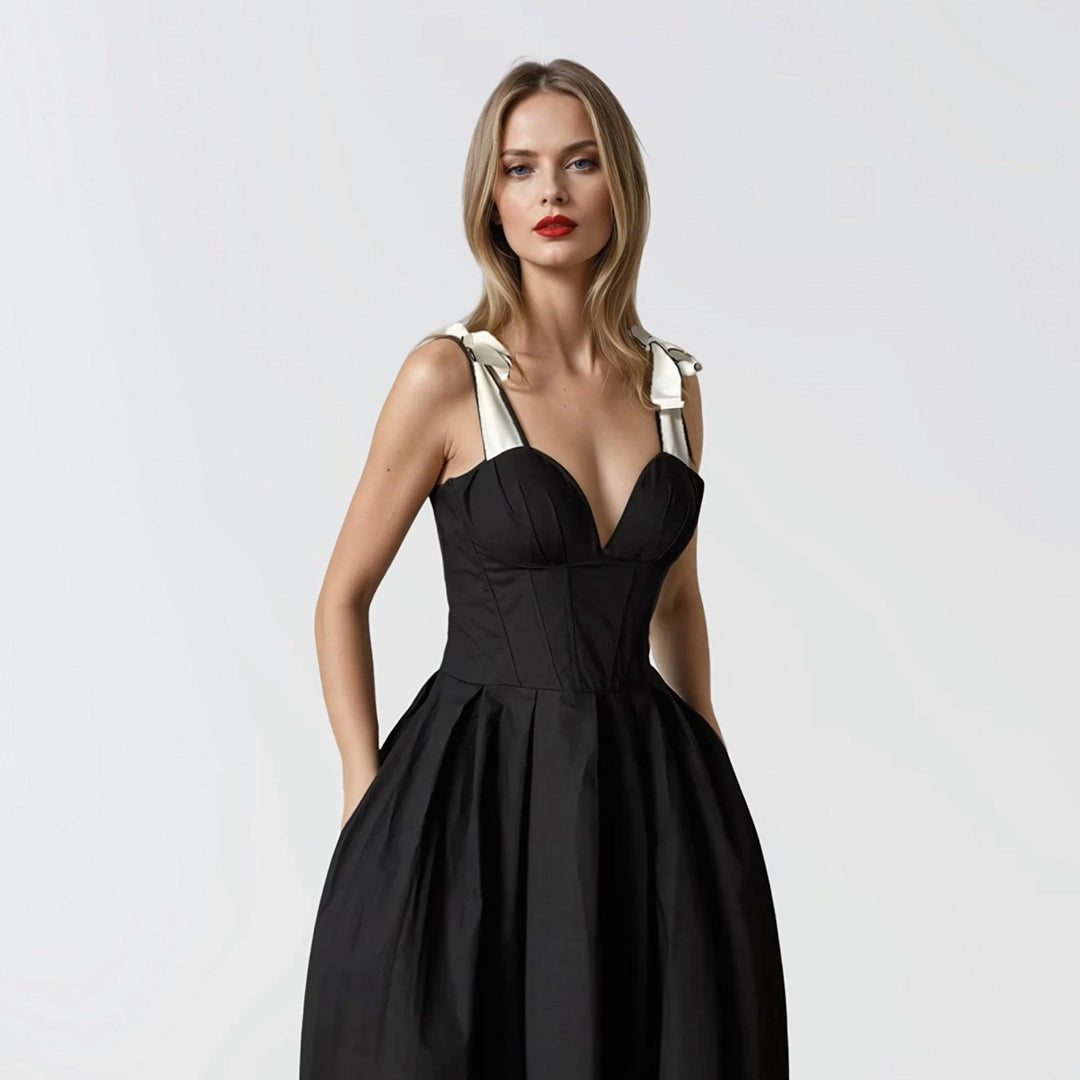 Black corset dress with contrasting trap ties