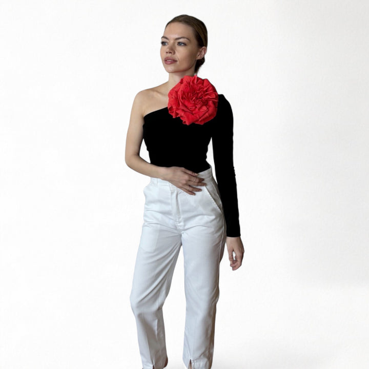 Black one sleeve top with red flower pin