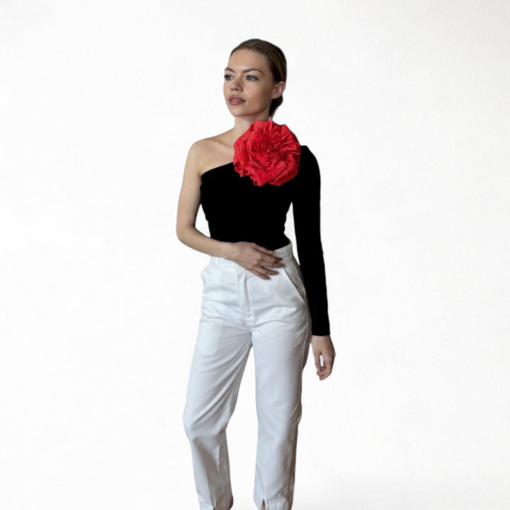 Black one sleeve top with red flower pin