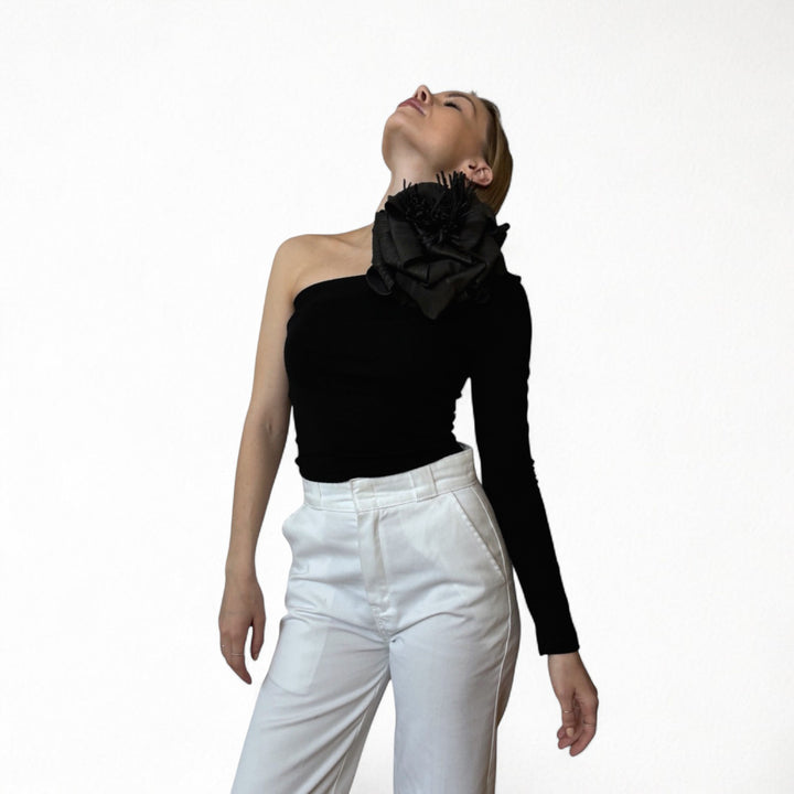 Black one sleeve top with black flower pin