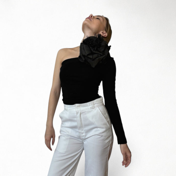 Black one sleeve top with black flower pin