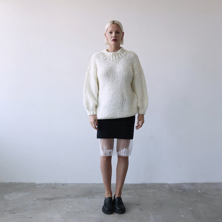 Black mini knit skirt with with embroidery lace