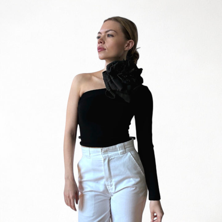 Black one sleeve top with black flower pin