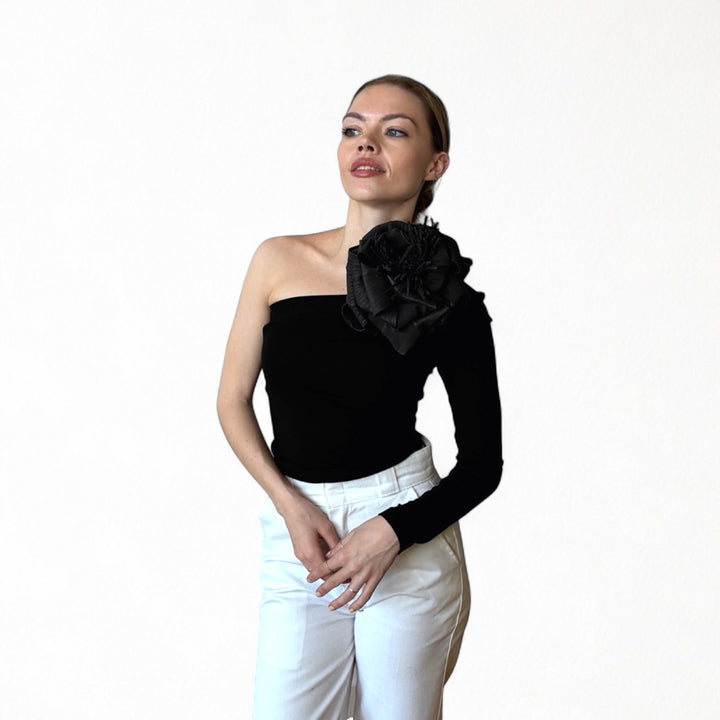 Black one sleeve top with black flower pin