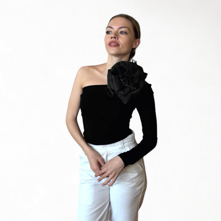 Black one sleeve top with black flower pin