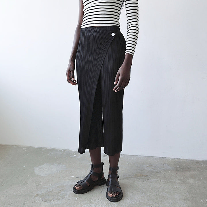 Black accordion pleated trousers with wrap detail