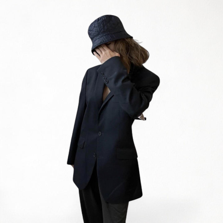 Reworked blazer with white pleated back appliqué