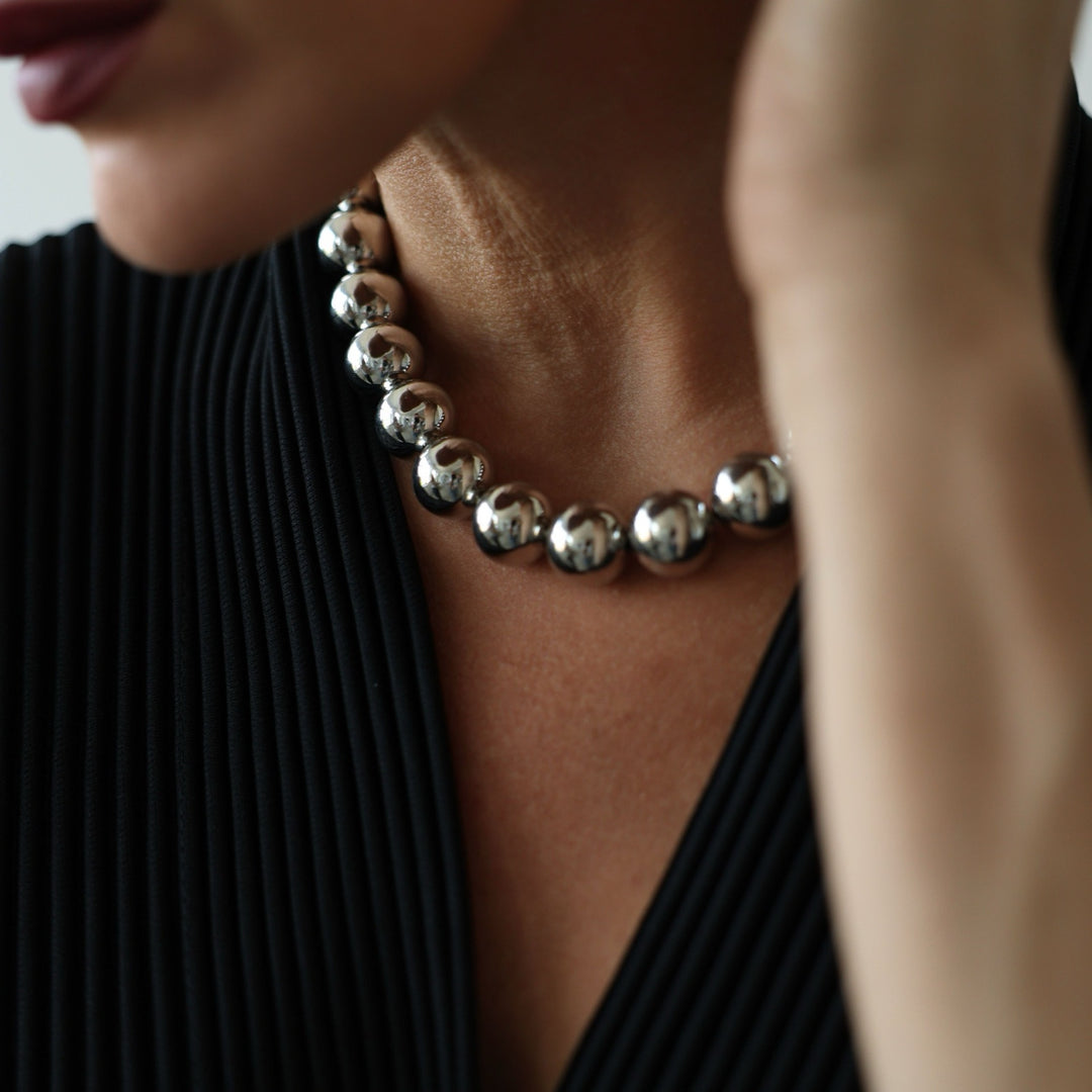 Silver string beaded necklace