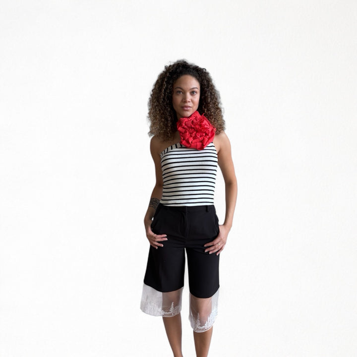 Striped one shoulder top with red flower pin