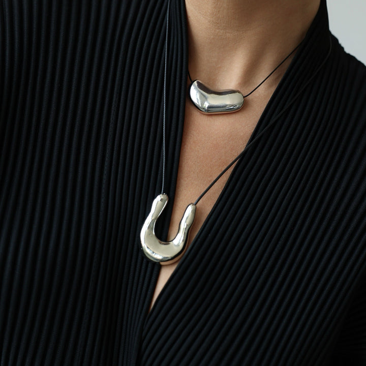 Silver bean geometric pendant necklace