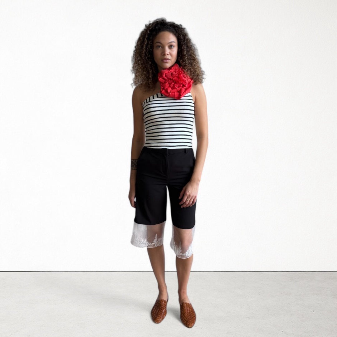 Striped one shoulder top with red flower pin