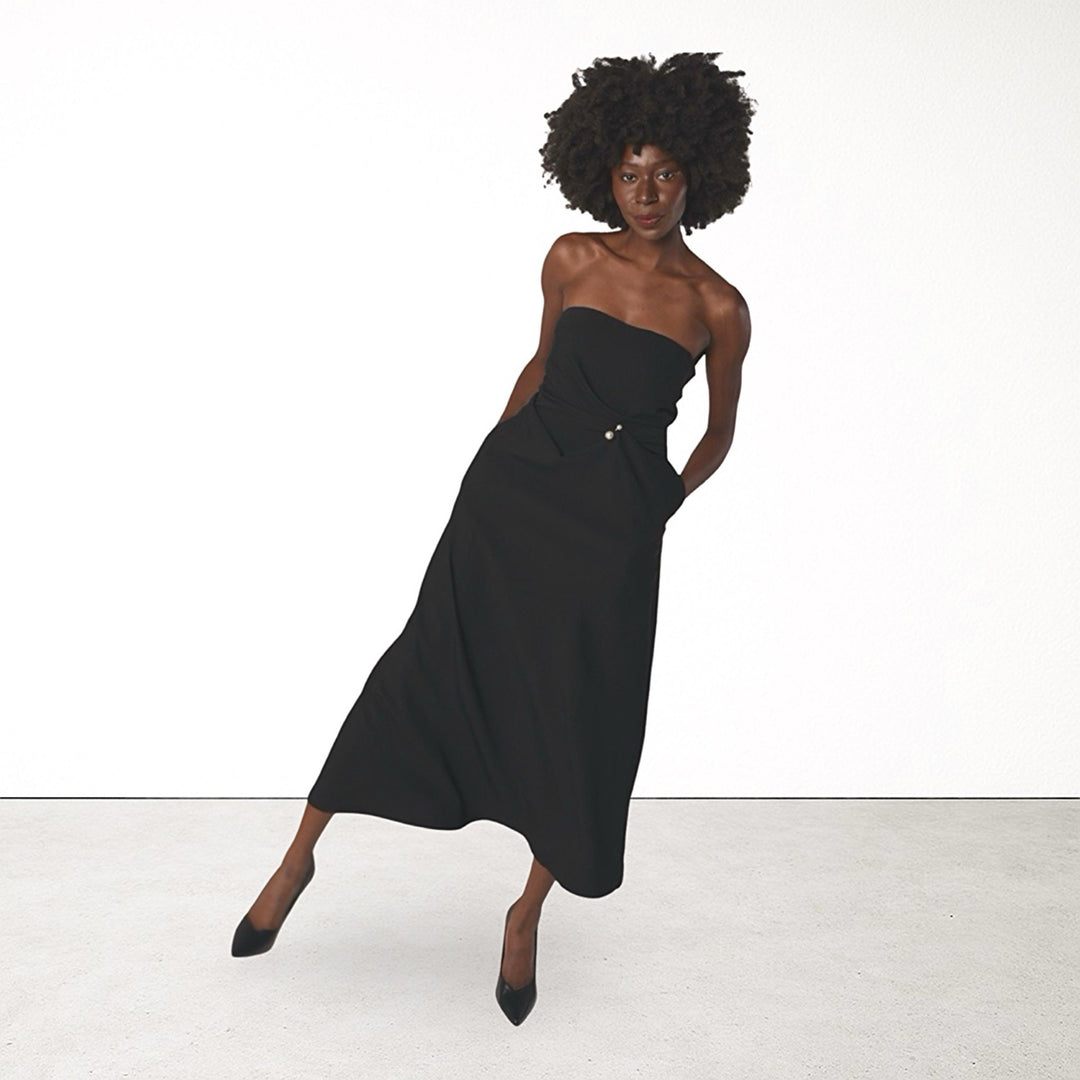 Black strapless dress with asymmetrical folds and pearl detail