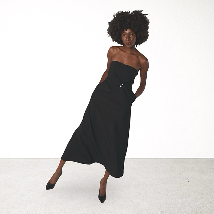 Black strapless dress with asymmetrical folds and pearl detail