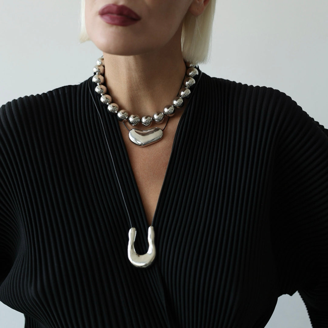 Silver string beaded necklace