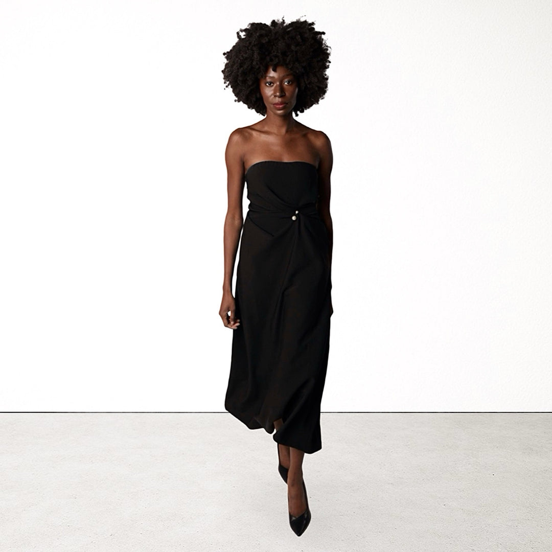 Black strapless dress with asymmetrical folds and pearl detail