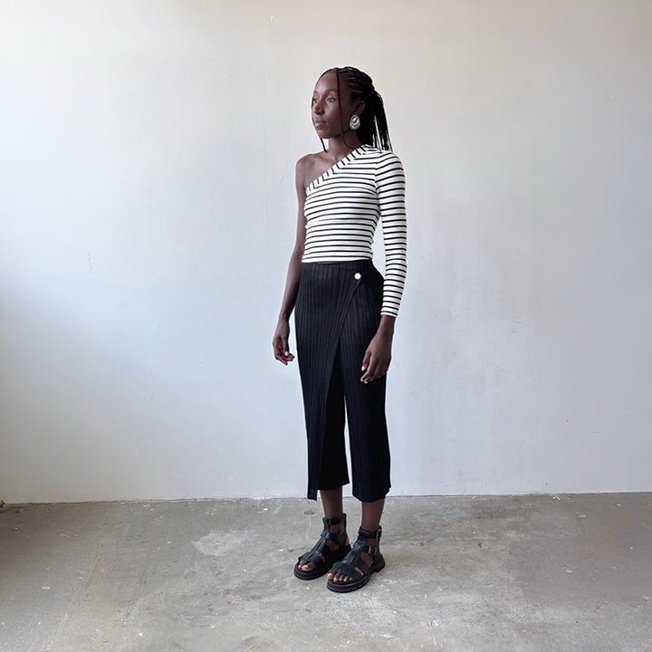Black accordion pleated trousers with wrap detail