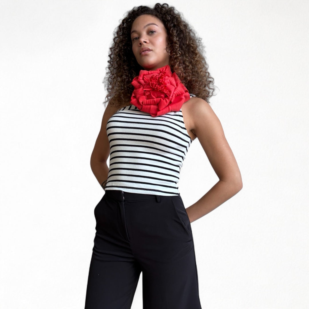 Striped one shoulder top with red flower pin