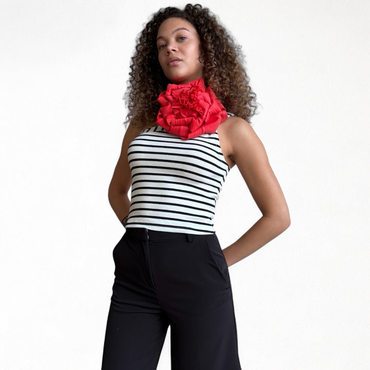 Striped one shoulder top with red flower pin