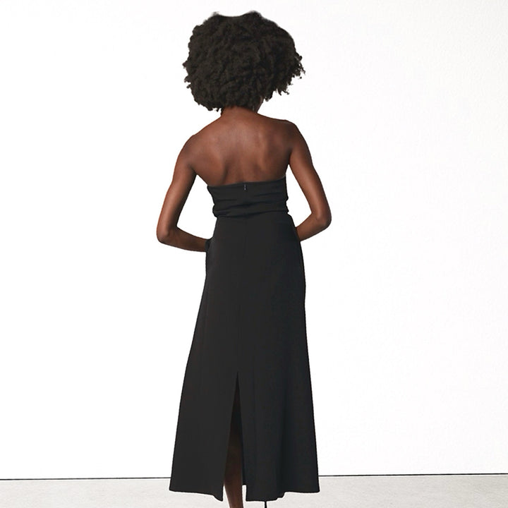 Black strapless dress with asymmetrical folds and pearl detail