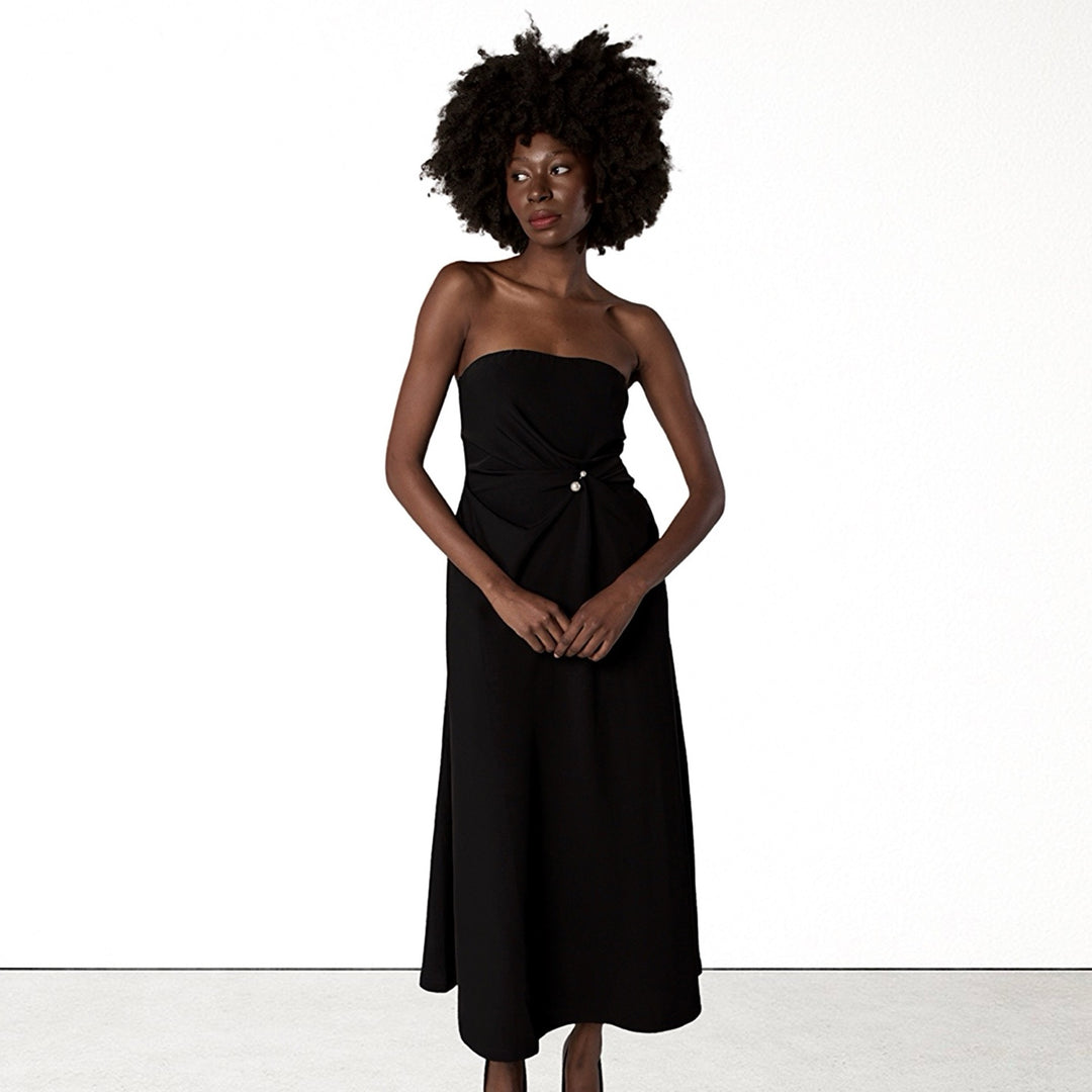 Black strapless dress with asymmetrical folds and pearl detail