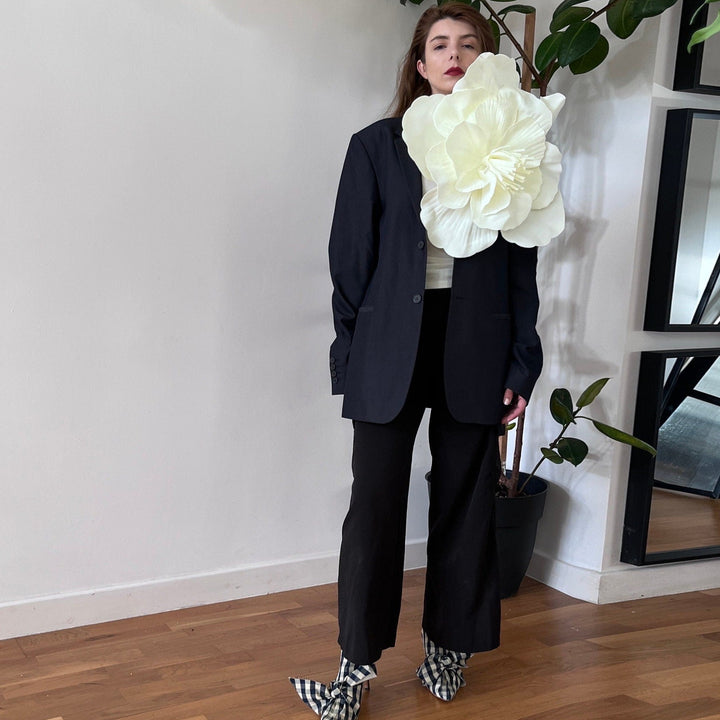 Reworked oversize blazer with big white flower pin