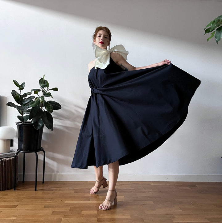 Navy cloche dress with one shoulder white bow