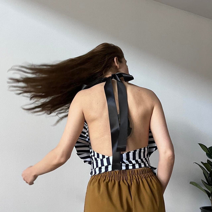 Black and white striped halter backless ruffle top